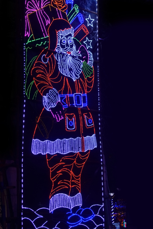 LED light Santa clause against black background.の写真素材