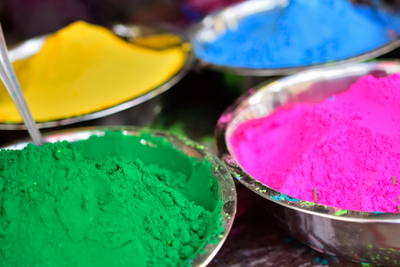 Colorful piles of powdered shopping for Holi festivalの写真素材