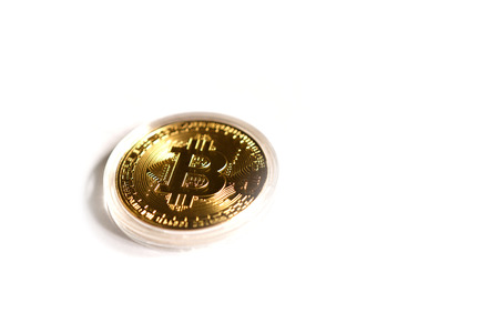 Gold Bitcoin on white backgroundの写真素材