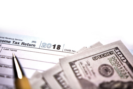 American tax form 1040 on white background. Fill-up American tax form.の写真素材