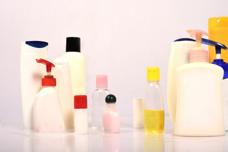 Many white plastic bottles on white background.の写真素材