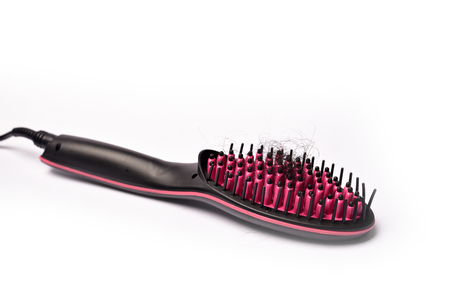 Comb hair on a white backgroundの写真素材