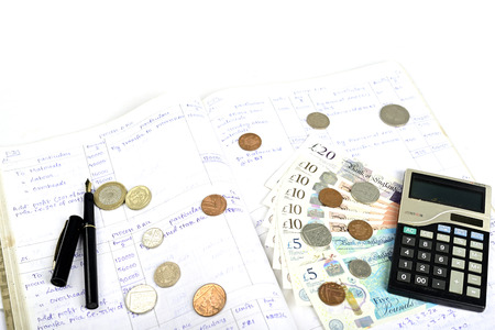 Accounting British currency pound sterling isolated on white background.