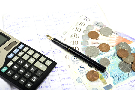 Accounting British currency pound sterling isolated on white background.の写真素材