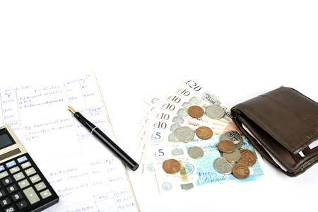 Accounting British currency pound sterling isolated on white background.の写真素材