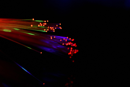 Fiber optics cable isolated on black backgroundの写真素材