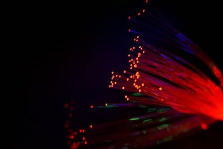 Fiber optics cable isolated on black backgroundの写真素材
