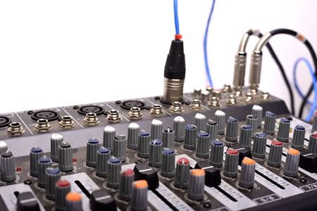 Close-up of modern digital sound mixer in a sound recording studio