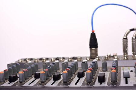 Close-up of modern digital sound mixer in a sound recording studioの写真素材
