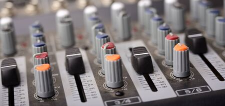 Close-up of modern digital sound mixer in a sound recording studio