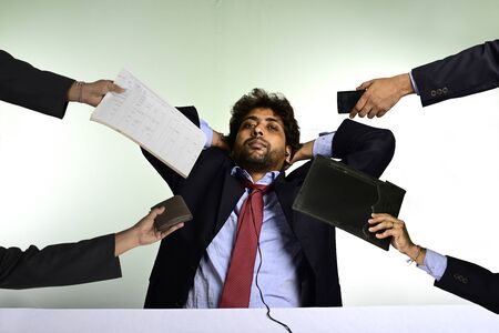 Happy and relaxed businessman at office
