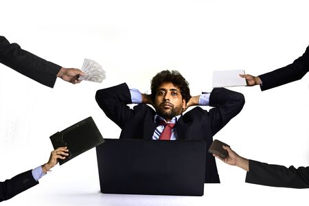 Happy and relaxed businessman at office