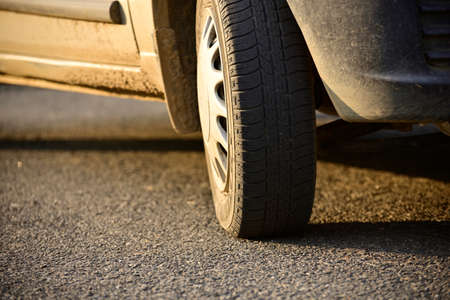 Close-up image of car wheel, rubber tire