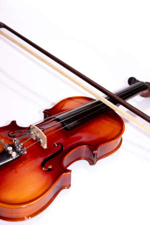 Front view of violin with Violin stick isolated on white backgroundの写真素材