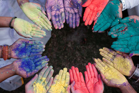 Group of Indian people playing Holi