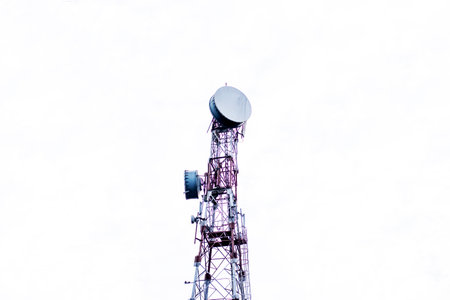 Telecommunication tower isolated against white backgroundの写真素材