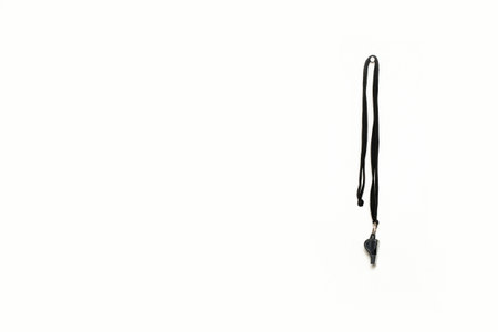 Soccer whistle hanging isolated on white backgroundの写真素材