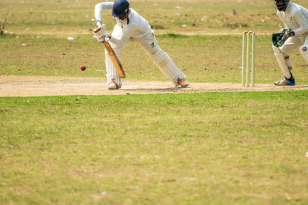 Cricket batsman is playing forward defensive strokeの写真素材