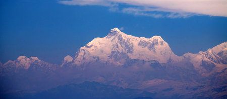 Kanchenjunga pick against blue skyの写真素材