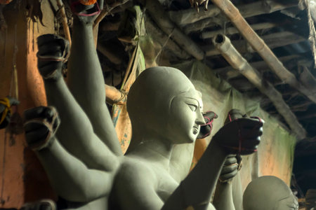 Goddess idols are being prepared with clay before festival. Idols being made for Durga Puja festival.の写真素材