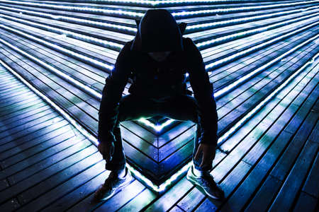 a man siting at Light straitのeditorial素材