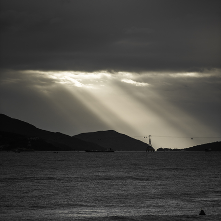 Tearing the clouds to the seaの写真素材