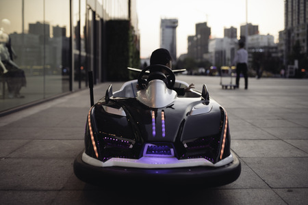 Children playing electric car