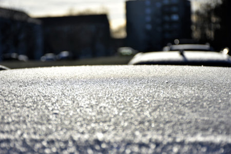 Frozen winter abstract background with a pattern on the window glass with copy spaceの写真素材