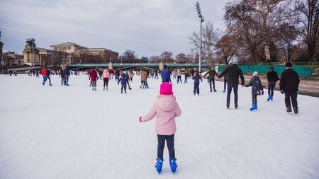 BUDAPEST, HUNGARY - DECEMBER 31, 2018: Many people spend their holidays skating in City Park ice rink in Budapest, Hungaryのeditorial素材