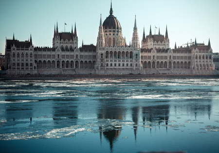 Hungarian parliament building at winter. Budapest. River with iceの写真素材