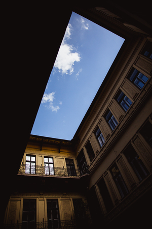 Bottom up view of old yard well in Budapest, Hungary, Europeの写真素材