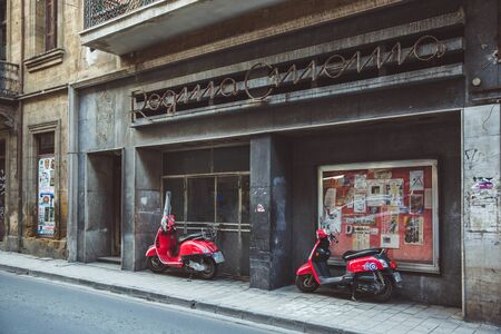 NICOSIA, CYPRUS - FEBRUARY 20, 2017: Old cinema and red moped in Nicosia, Cyprusのeditorial素材