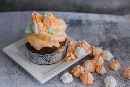 Easter Cake decorated with orange merengue - Traditional Kulich, Paska Easter Bread