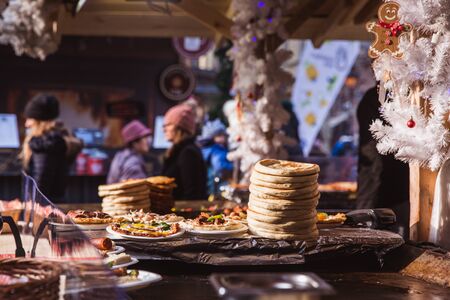 Local food on Christmas Market at St. Stephens Square in front of the St. Stephens Basilicain Budapestの写真素材