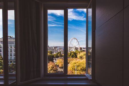 View from the window to Budapest Eye and St. Stephens Basilica in Budapest, Hungaryの写真素材