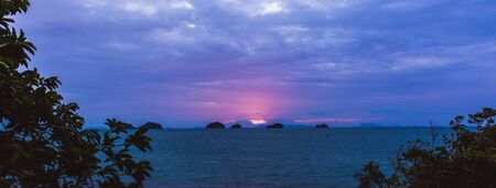 Beautiful sea sunset with pink colors with clouds