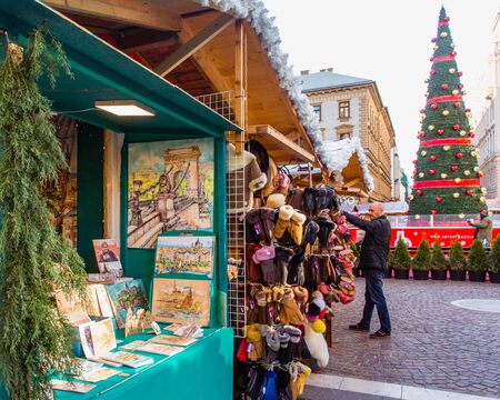 BUDAPEST, HUNGARY - November 21, 2019: Christmas tree and the beautiful Christmas Market in front of the St. Stephens Basilica.のeditorial素材