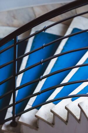 Blue background made for Old blue spiral staircase inside an old house. Color 2020.の写真素材