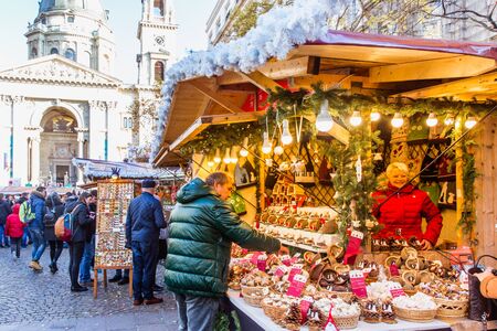 BUDAPEST, HUNGARY - November 21, 2019: Christmas Market at St. Stephens Square in front of the St. Stephens Basilica.のeditorial素材