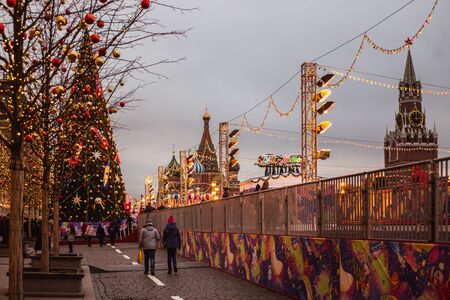 MOSCOW, RUSSIA- DECEMBER 16, 2019: Tourists and local people enjoying the beautiful New Year...