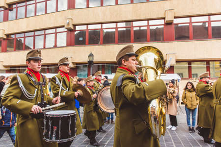 BUDAPEST - MARCH 15, 2019: Hungarian military orchestra is playing music on a street in the Buda Castle on 15th os March, which is Hungarys national day.のeditorial素材