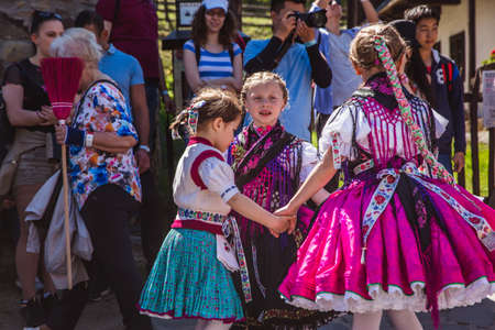HOLLOKO, HUNGARY - April 12, 2019: Easter festival in the folklore village of Holloko Traditional girls danceのeditorial素材