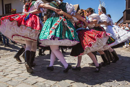 HOLLOKO, HUNGARY - April 12, 2019: Easter festival in the folklore village of Holloko Traditional girls danceのeditorial素材