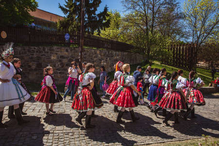 HOLLOKO, HUNGARY - April 12, 2019: Easter festival in the folklore village of Holloko in Hungary. Girls dressed in national costumesのeditorial素材
