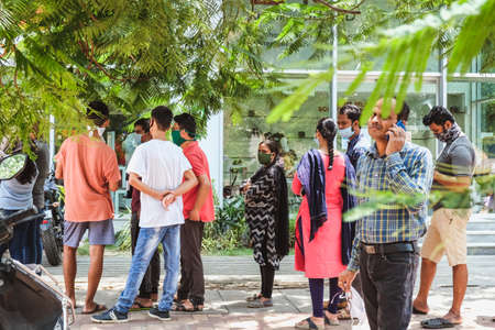 Bangalore, India - May 31, 2020. Citizens stand in line to shop during a pandemic. During the...