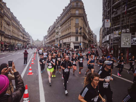 PARIS - June 9 2019: Participants compete in the 10KM DE PARIS in Paris.のeditorial素材