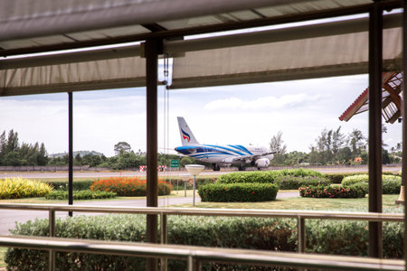 Koh Samui, Thailand - August 2019: Bangkok Airlines plane moves along the runway of Koh Samui...