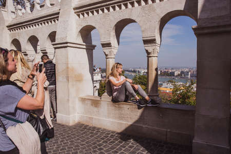 BUDAPEST, HUNGARY, October 09 2019: Crowds of tourists are takes photos and enjoying the panoramic view from the Fisherman Bastion in Budapest.のeditorial素材