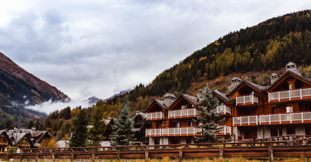 Traditional alpine houses in mountains, Dolomites Mountains, Italyの写真素材