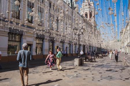 MOSCOW, RUSSIA - July 07, 2021. Tourists and citizens on Nikolskaya street. Moscow
